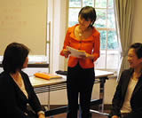 Nutritionists doing a role play at a food coaching seminar.